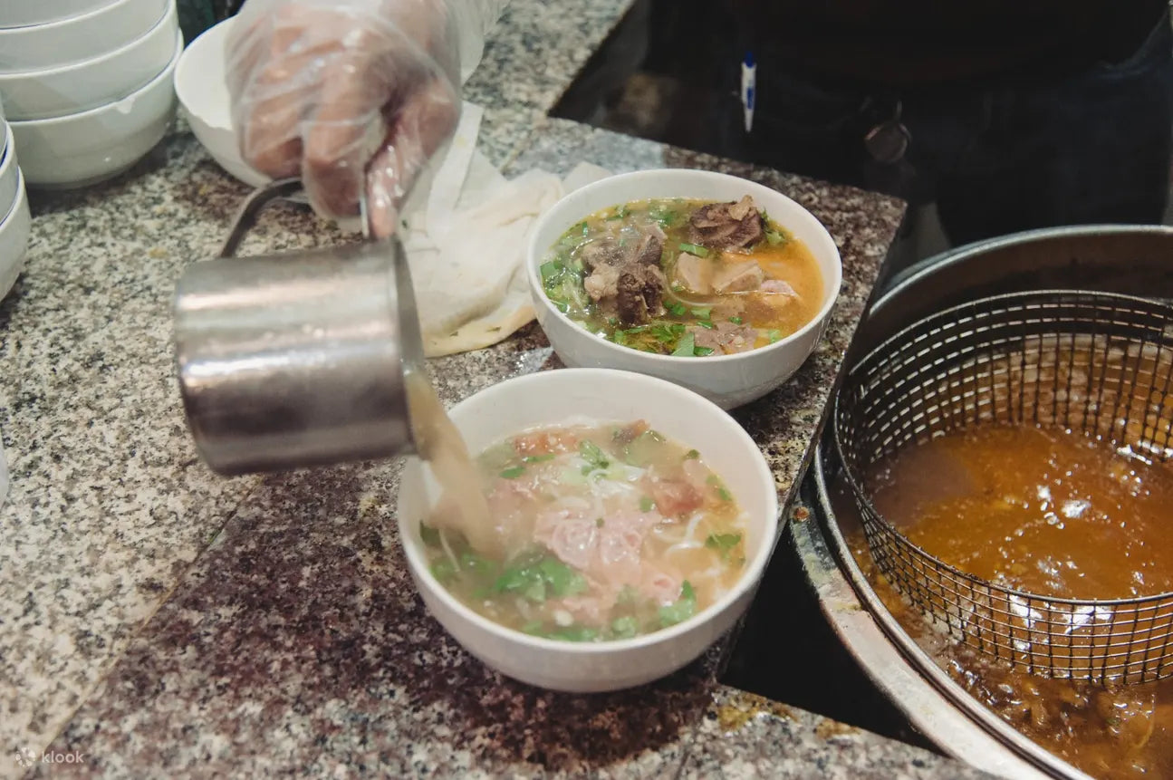 SGM: Food on Scooter Tour! (HCMC)